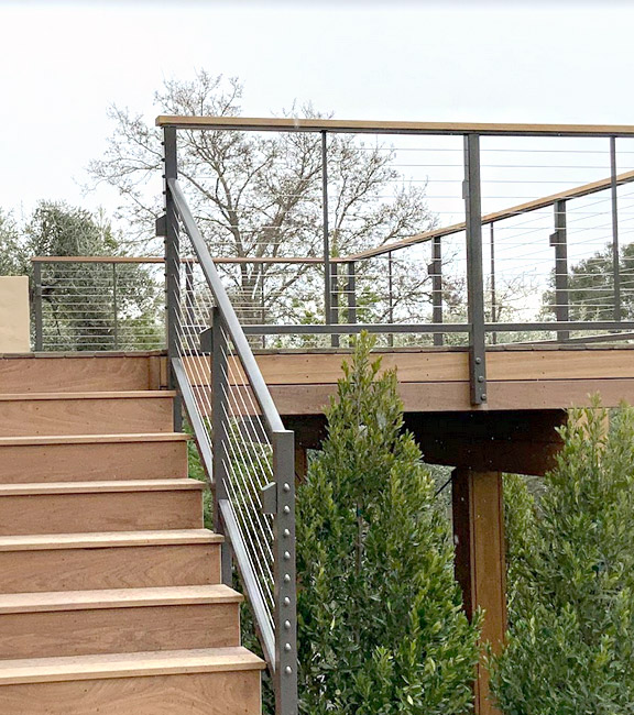 cable railing porch and stair railing with wood handrail and fascia mounts