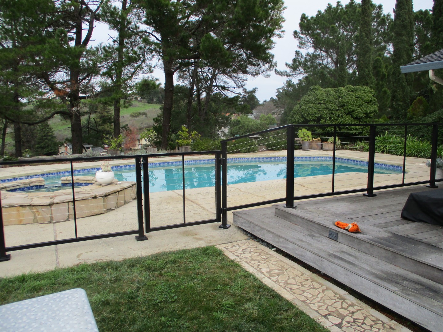 Our pros installed these cable railings around a pool