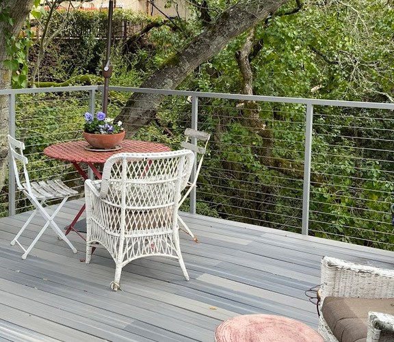 a stylish stainless steel railing installed on a deck