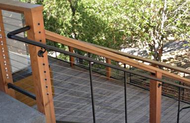 outdoor staircase with wood post railings